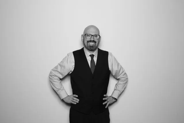 DJ Lou Paris at a wedding, black and white